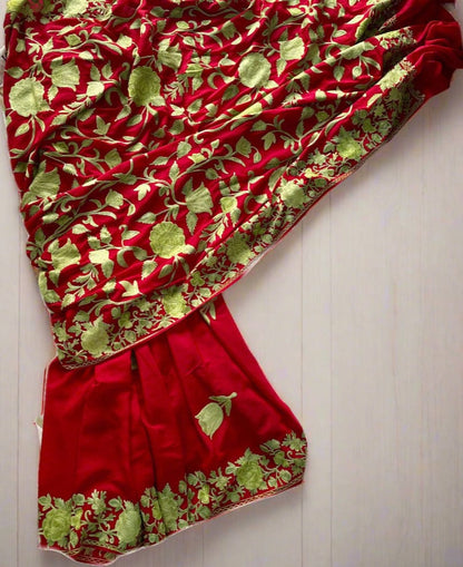 Red semi-crepe saree
